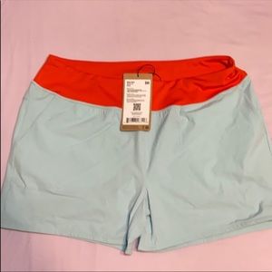 Cotopaxi women’s athletic shorts with pockets